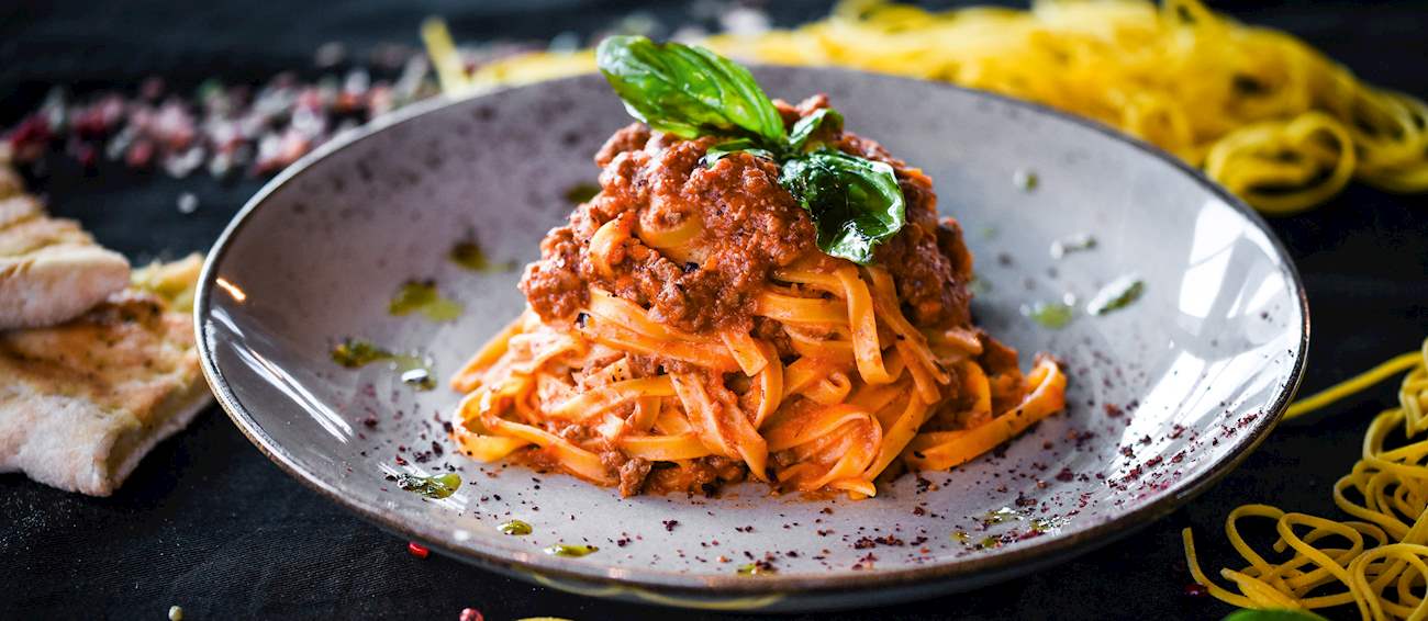 Tagliatelle al Ragù Alla Bolognese | Traditional Pasta From Bologna, Italy | TasteAtlas